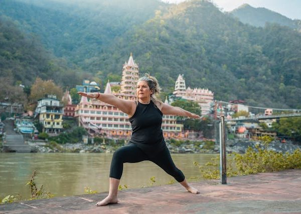 Yoga at the River Ganges Near the Hindu Temple of Trimbakeshwar Om Shiv Pooja Bhandar w Rishikesh